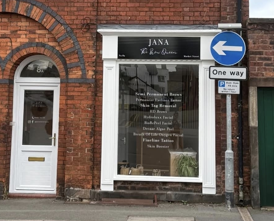 The shopfront at No.8a Market Street by day, with treatments lettered on the window