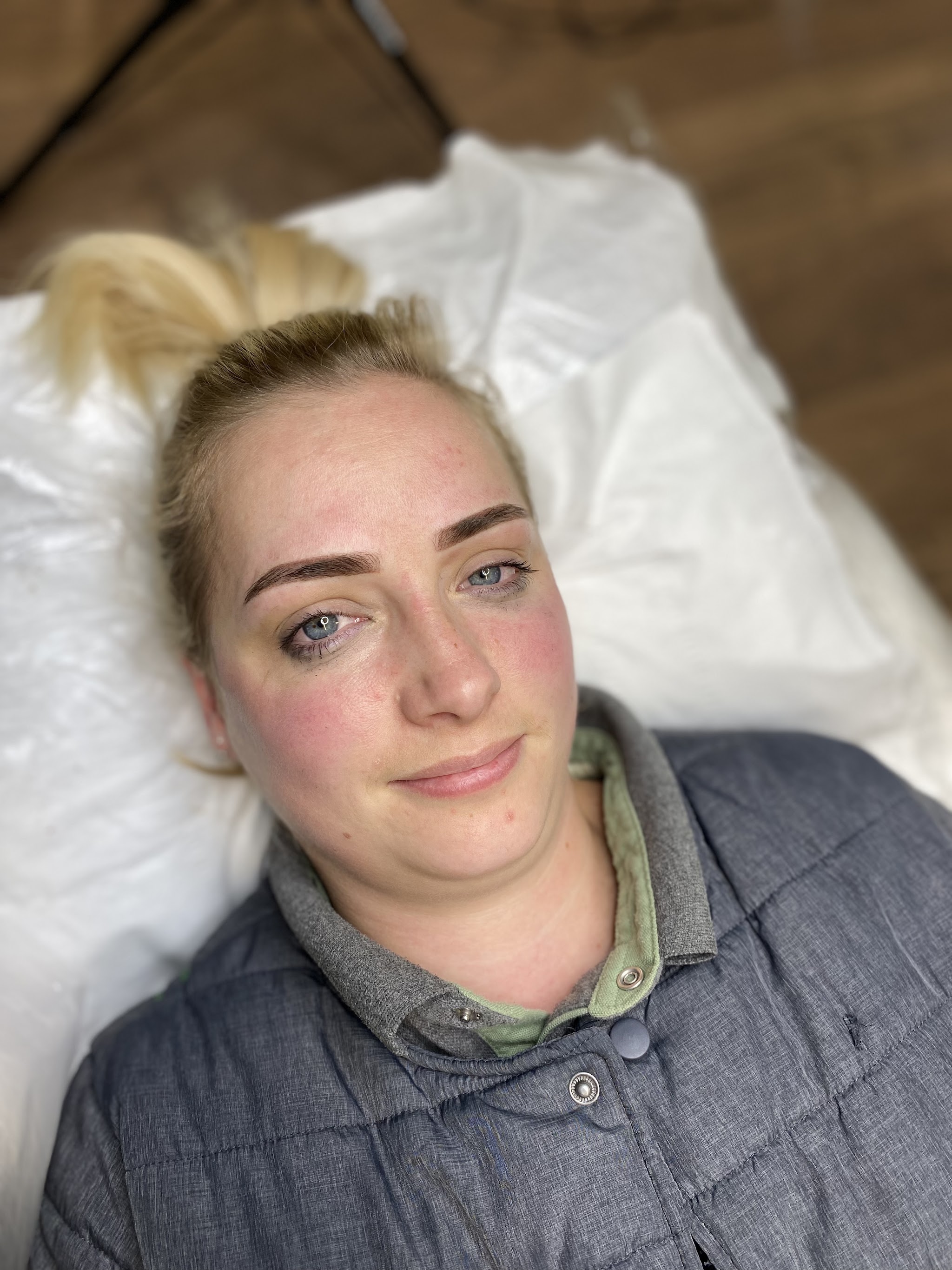 Client on the couch after her brow treatment